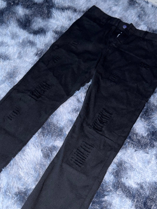 Pantalón con diseño en roto